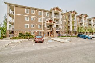 Photo 1: 203 406 Cranberry Park SE in Calgary: Cranston Apartment for sale : MLS®# A2050067