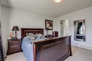 Photo 19: 28 Cougarstone Square SW in Calgary: Cougar Ridge Detached for sale : MLS®# A1099416
