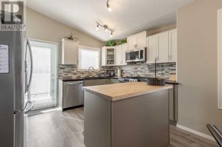 Photo 10: 110 Heritage Court W in Lethbridge: House for sale : MLS®# A2081300