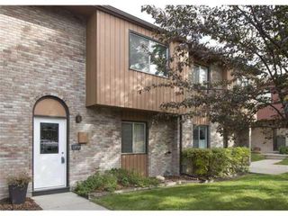 Photo 2: 80 210 86 Avenue SE in Calgary: Acadia Row/Townhouse for sale : MLS®# A1192446