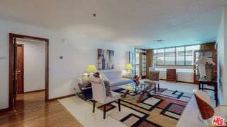 Photo 1: 880 W 1st Street Unit 402 in Los Angeles: Residential for sale (C42 - Downtown L.A.)  : MLS®# 23311011