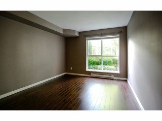 Photo 8: 114 7505 138TH Street in Surrey: East Newton Condo for sale in "Midtown Villa" : MLS®# F1417804