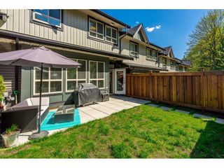 Photo 18: 4 10525 240 Street in Maple Ridge: Albion Townhouse for sale in "Magnolia Grove" : MLS®# R2365683
