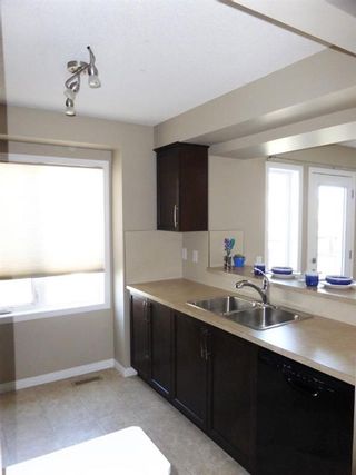 Photo 4: 464 WINDSTONE Grove SW: Airdrie Row/Townhouse for sale : MLS®# A2107159
