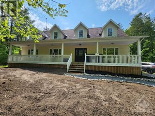 Photo 1: 255 MORRIS ISLAND DRIVE in Arnprior: House for sale : MLS®# 1342026