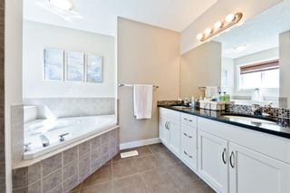 Photo 21: 125 COUGARSTONE Manor SW in Calgary: Cougar Ridge Detached for sale : MLS®# A1019561