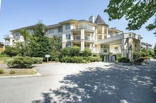 Photo 1: 204 20125 55A Avenue in Langley: Langley City Condo for sale in "Blackberry Lane 2" : MLS®# R2652609