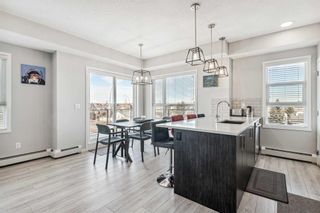Main Photo: 410 370 Harvest Hills Common NE in Calgary: Harvest Hills Apartment for sale : MLS®# A2115316