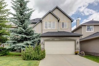 Photo 1: 19 COUGAR RIDGE View SW in Calgary: Cougar Ridge Detached for sale : MLS®# A1177617