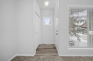 Photo 2: 12 Bridlewood View SW in Calgary: Bridlewood Row/Townhouse for sale : MLS®# A2035108