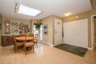 Photo 4: 404 2733 ATLIN Place in Coquitlam: Coquitlam East Condo for sale in "ATLIN COURT" : MLS®# R2232992
