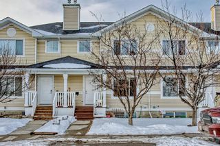 Photo 1: 172 Bridleridge Gardens SW in Calgary: Bridlewood Row/Townhouse for sale : MLS®# A2023273