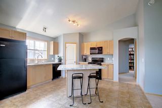 Photo 11: 205 70 Panatella Landing NW in Calgary: Panorama Hills Row/Townhouse for sale : MLS®# A1223952