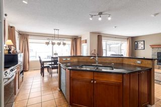 Photo 10: 200 Cougartown Close SW in Calgary: Cougar Ridge Detached for sale : MLS®# A2124049