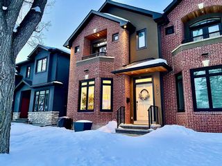Photo 2: 620 25 Avenue NW in Calgary: Mount Pleasant Semi Detached (Half Duplex) for sale : MLS®# A2029192