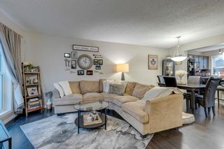 Photo 3: 104 Auburn Bay Street SE in Calgary: Auburn Bay Duplex for sale : MLS®# A1172826