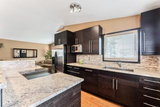 Photo 7: 219 Riverbirch Road SE in Calgary: Riverbend Detached for sale : MLS®# A1109121