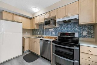 Photo 5: 10 Coachway Gardens SW in Calgary: Coach Hill Row/Townhouse for sale : MLS®# A2126800