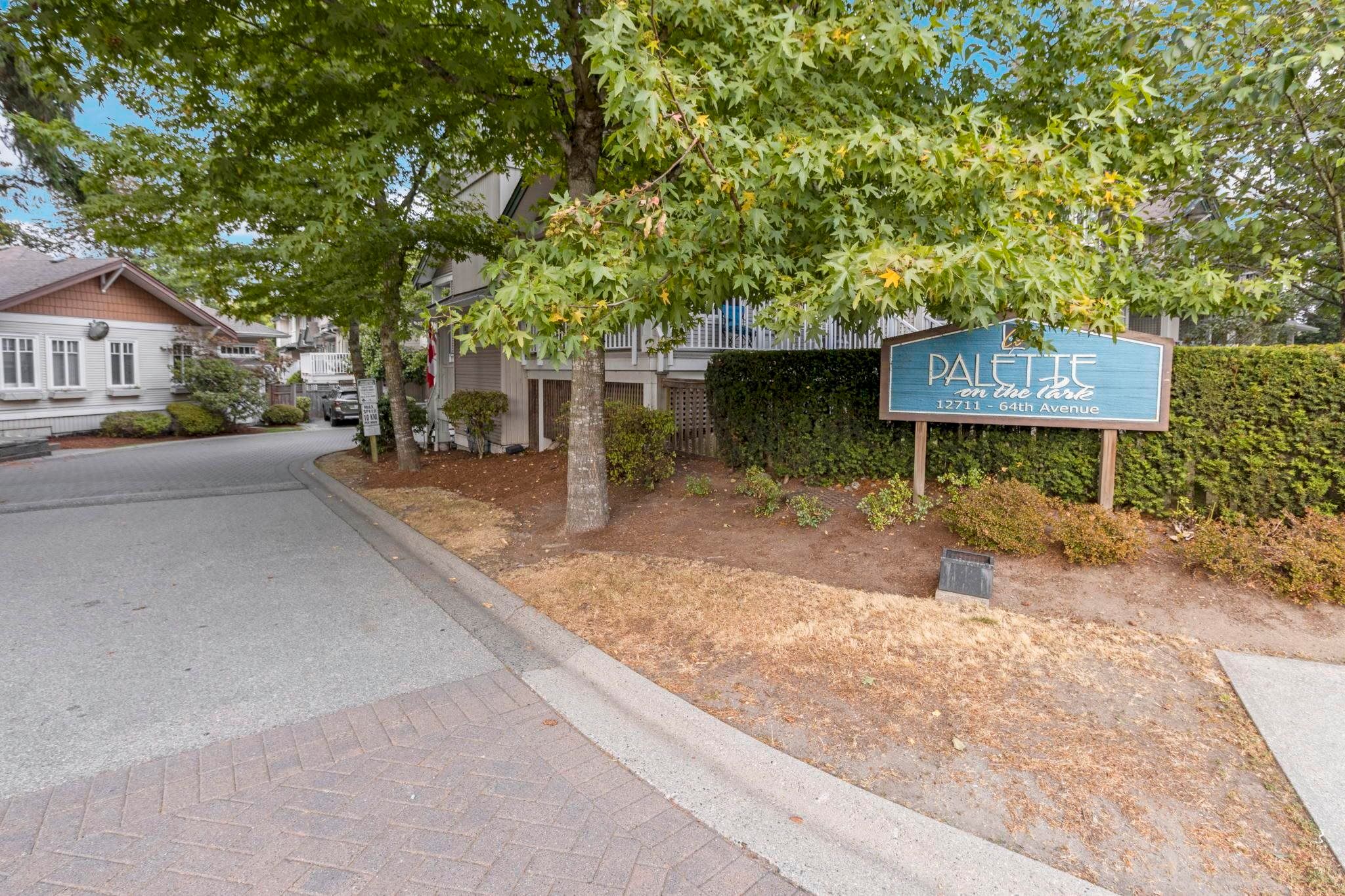 Main Photo: 50 12711 64 Avenue in Surrey: West Newton Townhouse for sale in "Palette On The Park" : MLS®# R2723614