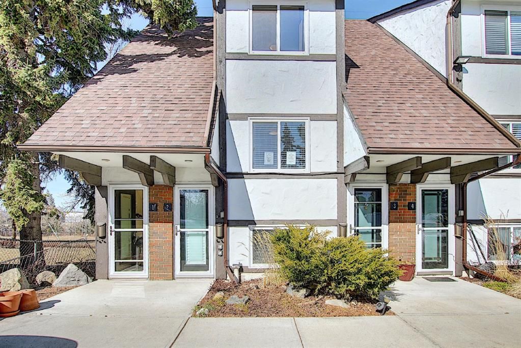 Main Photo: 2 304 Cedar Crescent SW in Calgary: Spruce Cliff Row/Townhouse for sale : MLS®# A1153924