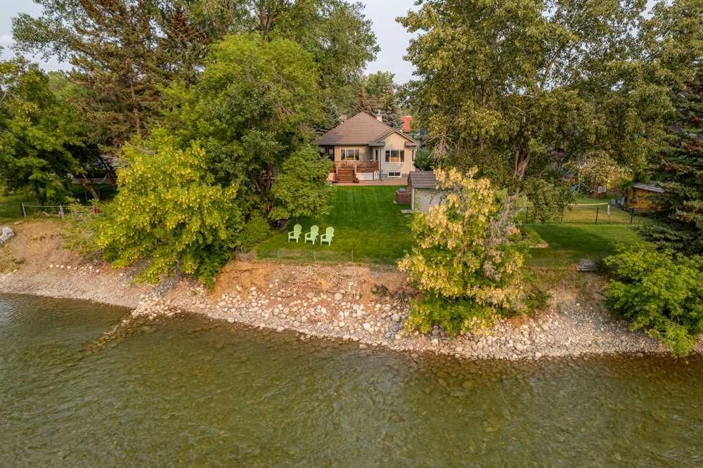Extremely well maintained bungalow located on a river front lot on sought after Bow Crescent