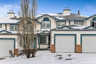 Photo 1: 103 Citadel Heights NW in Calgary: Citadel Row/Townhouse for sale : MLS®# A1206475