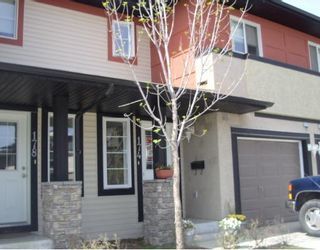 Main Photo: EVERSYDE CM SW in Calgary: Evergreen Townhouse for sale