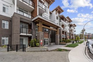 Photo 1: 214 5415 BRYDON Crescent in Langley: Langley City Condo for sale : MLS®# R2692348