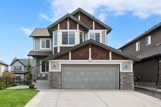 Photo 1: 51 Tremblant Point SW in Calgary: Springbank Hill Detached for sale : MLS®# A1230453