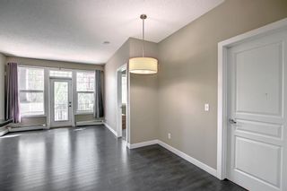Photo 9: 209 76 Panatella Road NW in Calgary: Panorama Hills Apartment for sale : MLS®# A1244884