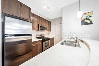 Photo 5: 301 2 Hemlock Crescent SW in Calgary: Spruce Cliff Apartment for sale : MLS®# A2121692