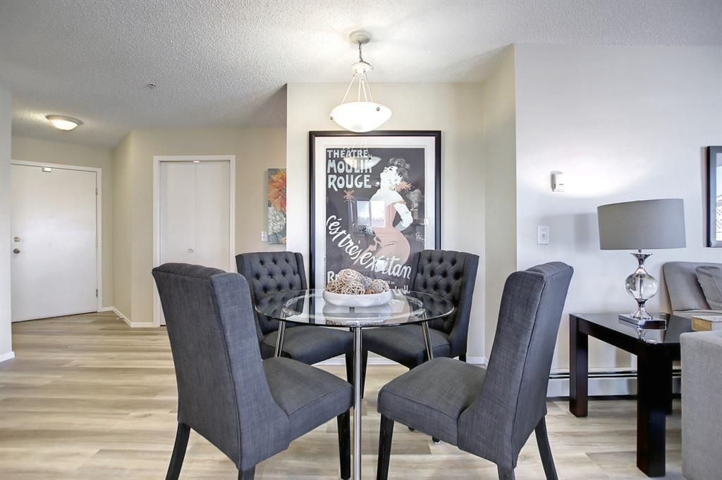 Main Photo: 6114 304 Mackenzie Way SW: Airdrie Apartment for sale : MLS®# A1156641