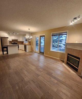 Photo 4: 406 Coral Cove NE in Calgary: Coral Springs Row/Townhouse for sale : MLS®# A2098781