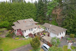 Photo 1: 4523 E Thompson Clarke Dr in Bowser: PQ Bowser/Deep Bay House for sale (Parksville/Qualicum)  : MLS®# 933374