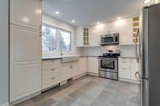 Photo 16: 409 Point Mckay Gardens NW in Calgary: Point McKay Row/Townhouse for sale : MLS®# A2015142