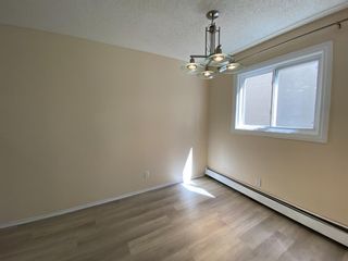 Photo 7: 4 3820 Parkhill Place SW in Calgary: Parkhill Row/Townhouse for sale : MLS®# A1236808