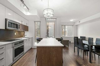 Photo 5: 120 619 Confluence Way SE in Calgary: Downtown East Village Apartment for sale : MLS®# A2114124