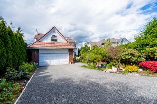 Main Photo: 1051 WINDWARD Drive in Coquitlam: Ranch Park House for sale : MLS®# R2884950