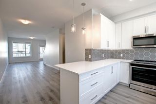 Photo 9: 608 16 Evanscrest Park NW in Calgary: Evanston Row/Townhouse for sale : MLS®# A1259126