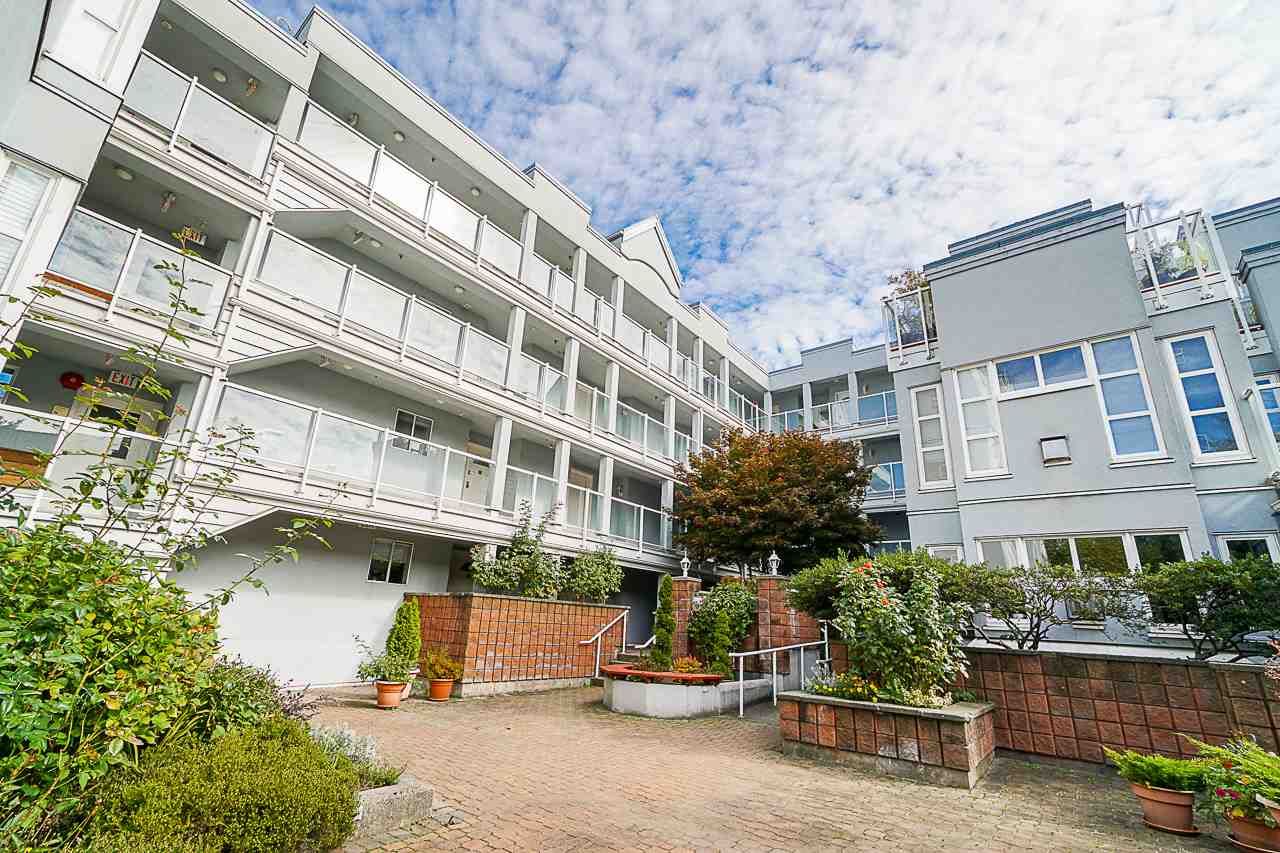 Main Photo: 105 8728 SW MARINE Drive in Vancouver: Marpole Condo for sale in "RIVERVIEW COURT" (Vancouver West)  : MLS®# R2567532