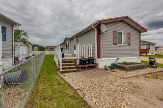 Photo 1: 7 15 Mackenzie Ranch Way: Lacombe Mobile for sale : MLS®# A2141961