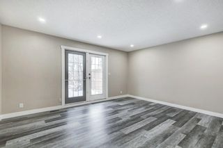 Photo 3: 4403 Bow Trail SW in Calgary: Rosscarrock Row/Townhouse for sale : MLS®# A2022311