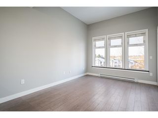 Photo 13: 407 20062 FRASER Highway in Langley: Langley City Condo for sale in "Varsity" : MLS®# R2640181