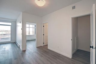 Photo 3: 316 500 Auburn Meadows Common SE in Calgary: Auburn Bay Apartment for sale : MLS®# A2022654
