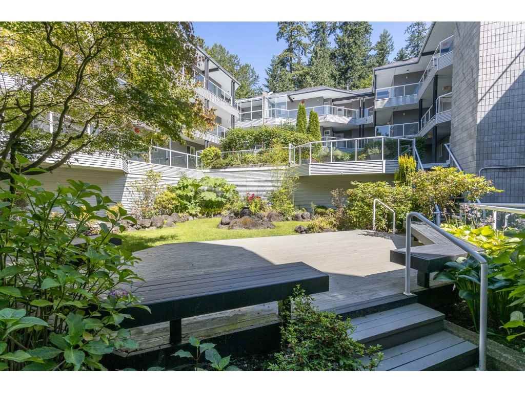 Main Photo: 102 2733 ATLIN Place in Coquitlam: Coquitlam East Condo for sale in "ATLIN COURT" : MLS®# R2475795