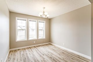 Photo 13: 20 Eversyde Park SW in Calgary: Evergreen Row/Townhouse for sale : MLS®# A1213117