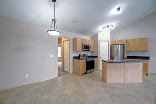 Photo 5: 204 100 Panatella Landing NW in Calgary: Panorama Hills Row/Townhouse for sale : MLS®# A1220825