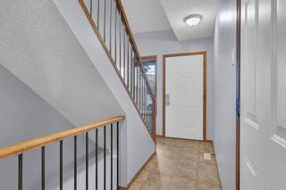 Photo 3: 75 Eversyde Court SW in Calgary: Evergreen Row/Townhouse for sale : MLS®# A2053916