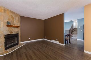 Photo 4: 127 DEER RIDGE Place SE in Calgary: Deer Ridge House for sale : MLS®# C4176684