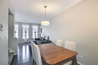 Photo 6: 314 Ascot Circle SW in Calgary: Aspen Woods Row/Townhouse for sale : MLS®# A1111264